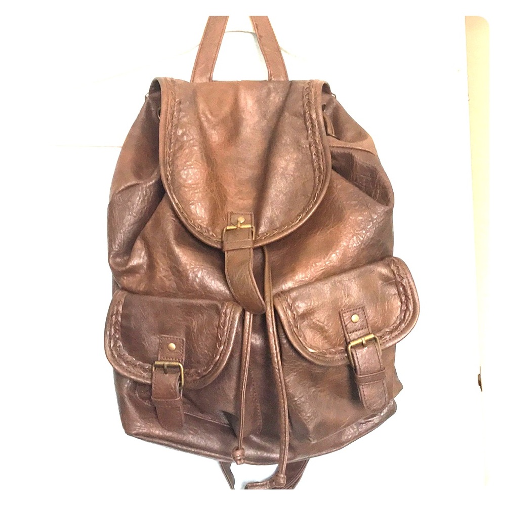 Faux brown leather back pack w/braid details